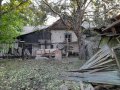В Горловке обстреляли два поселка, повреждены жилые дома, здание ДК и гараж (фото)
