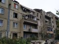 В результате прямого попадания снаряда в многоквартирный дом в Горловке погибло 4 человека
