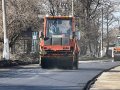 В Енакиево, в районе "Блочок", ведутся работы по укладке нового асфальта (фото)