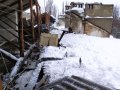 Из-за обильного снегопада в Горловке обрушились кровли многоэтажных домов,  повалены деревья